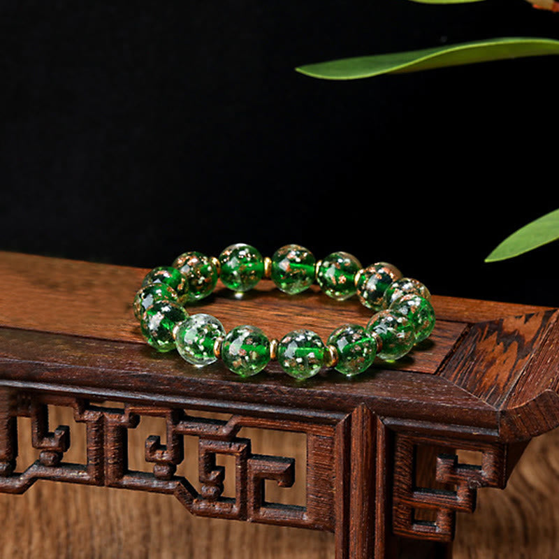 Bracelet en verre Liuli lumineux Bête avaleuse d'or 12 mm