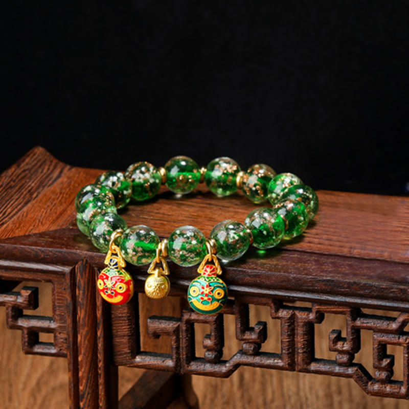 Bracelet en verre Liuli lumineux Bête avaleuse d'or 12 mm