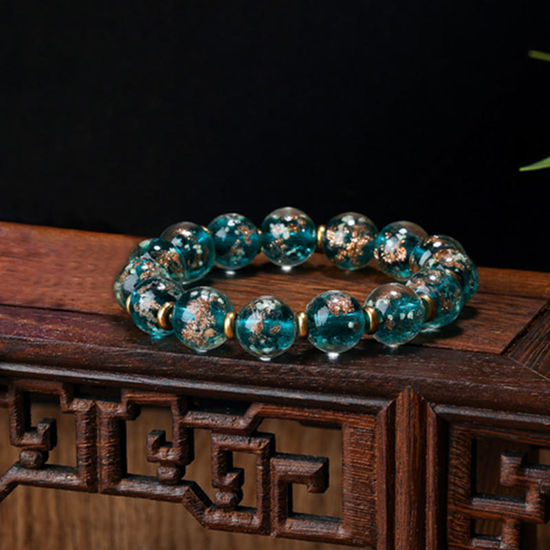 Bracelet en verre Liuli lumineux Bête avaleuse d'or 12 mm