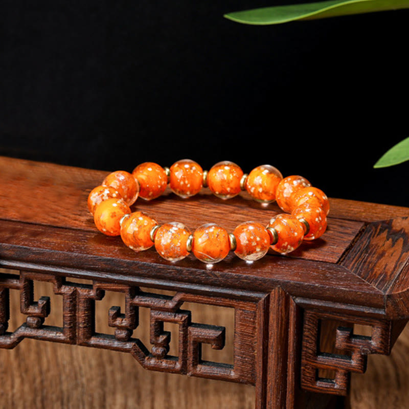 Bracelet en verre Liuli lumineux Bête avaleuse d'or 12 mm