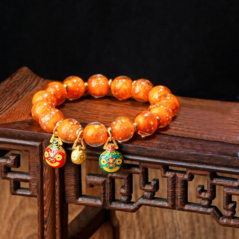 Bracelet en verre Liuli lumineux Bête avaleuse d'or 12 mm