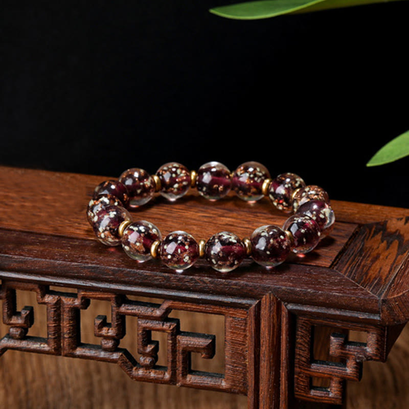 Bracelet en verre Liuli lumineux Bête avaleuse d'or 12 mm
