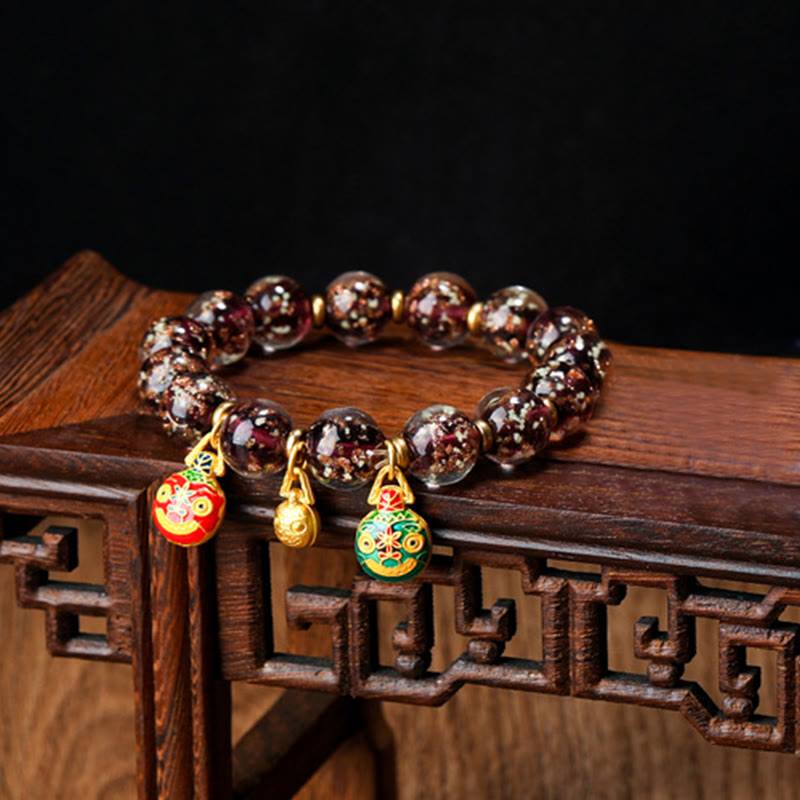 Bracelet en verre Liuli lumineux Bête avaleuse d'or 12 mm