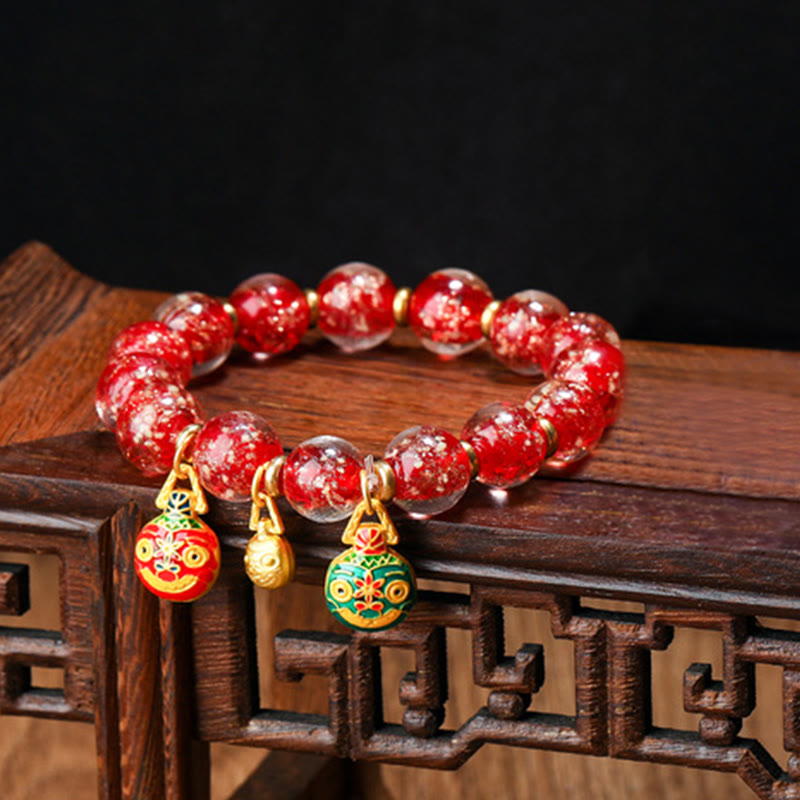 Bracelet en verre Liuli lumineux Bête avaleuse d'or 12 mm