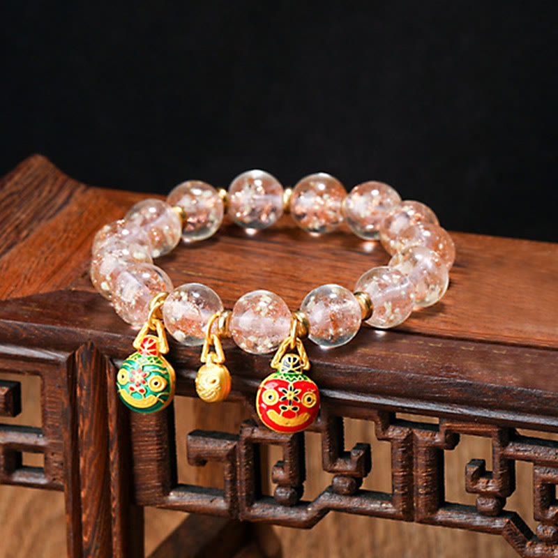 Bracelet en verre Liuli lumineux Bête avaleuse d'or 12 mm