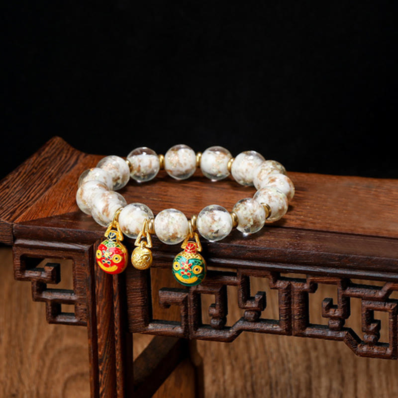 Bracelet en verre Liuli lumineux Bête avaleuse d'or 12 mm