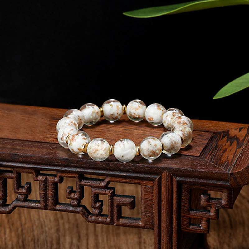 Bracelet en verre Liuli lumineux Bête avaleuse d'or 12 mm