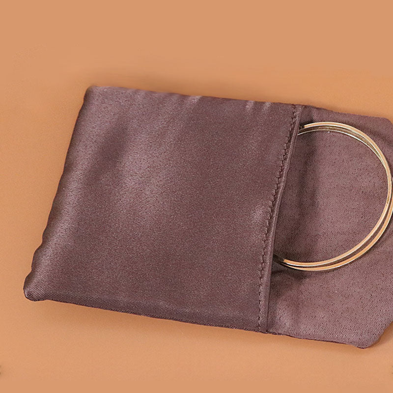Coffret à bijoux zen doré à motif plumes