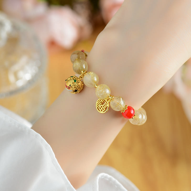 Bracelet de richesse en quartz rutile doré Fu Charm