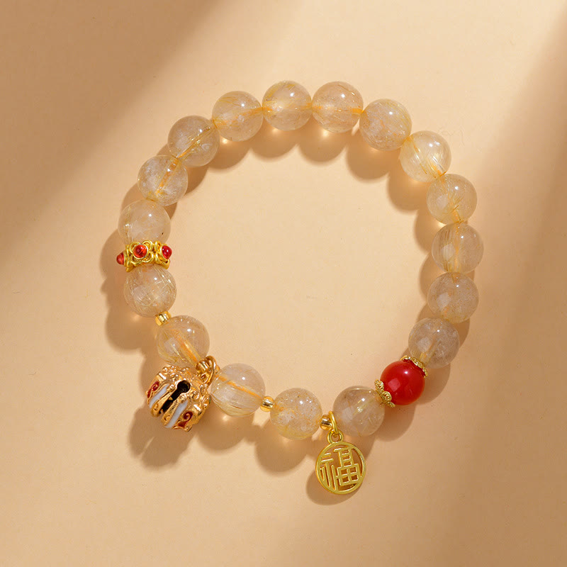 Bracelet de richesse en quartz rutile doré Fu Charm