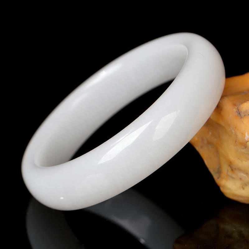 Bracelet jonc en jade et soie dorée 58 mm pour la richesse et la chance