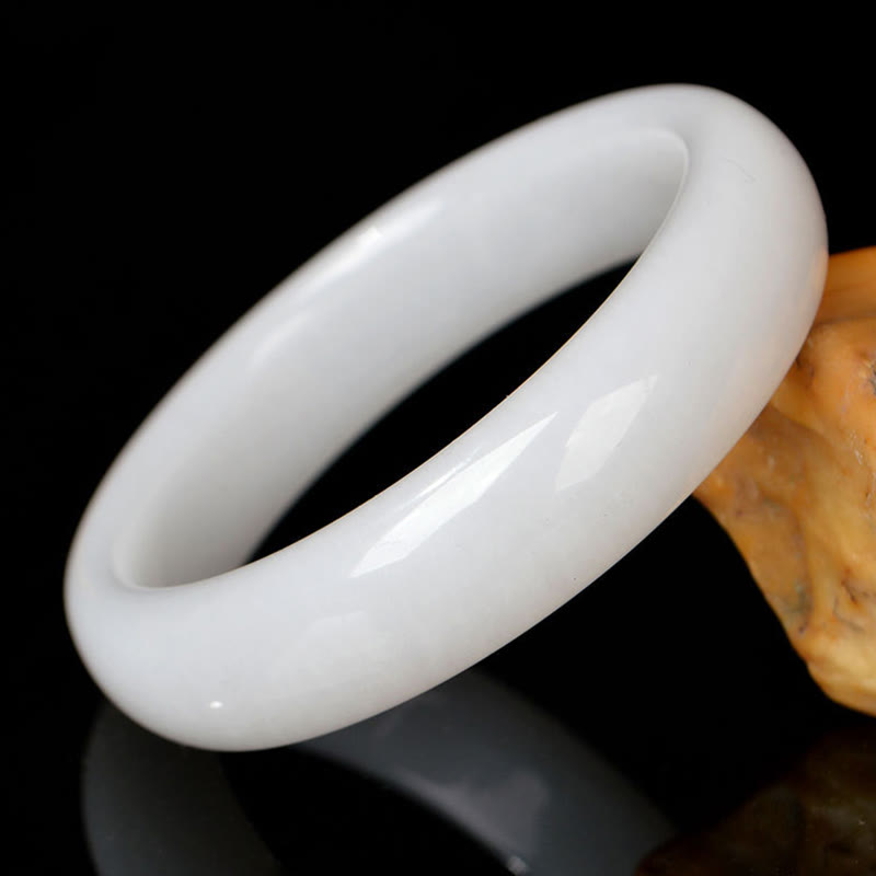 Bracelet jonc en jade et soie dorée 58 mm pour la richesse et la chance