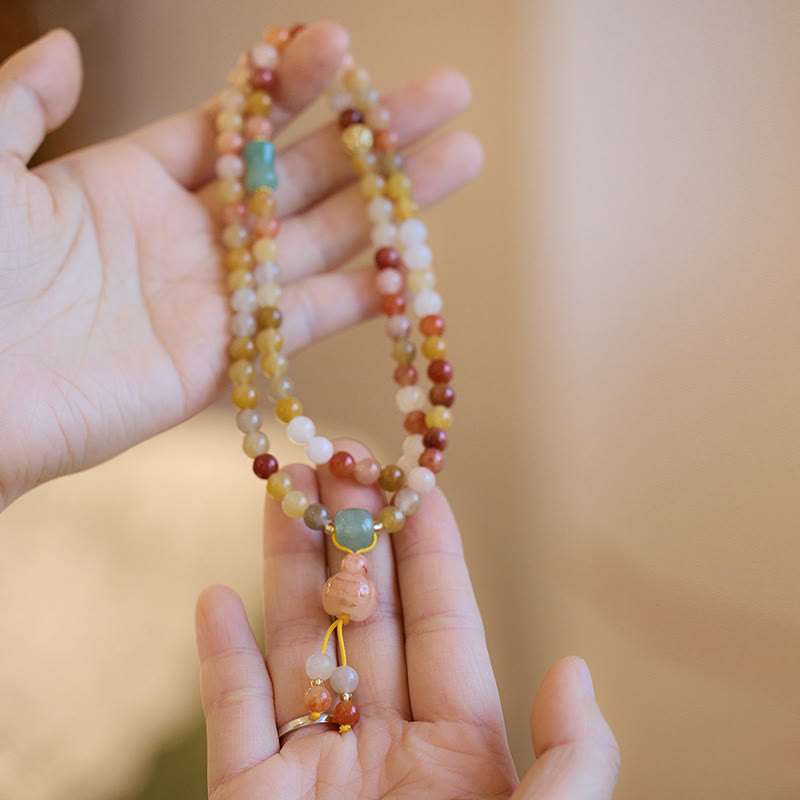 Bracelet triple tour en jade et soie dorée pour la richesse et la chance