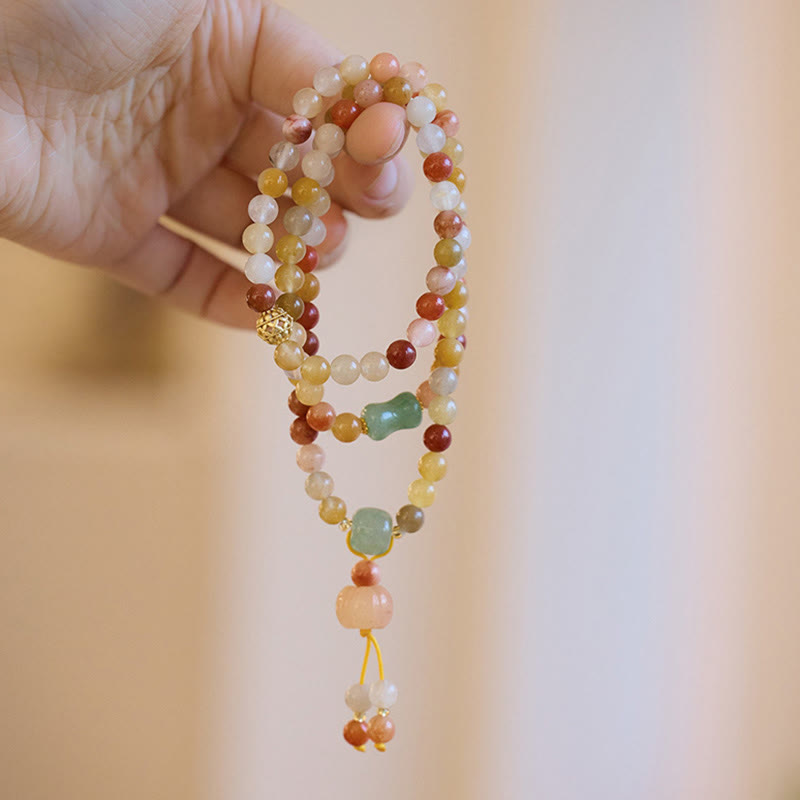 Bracelet triple tour en jade et soie dorée pour la richesse et la chance