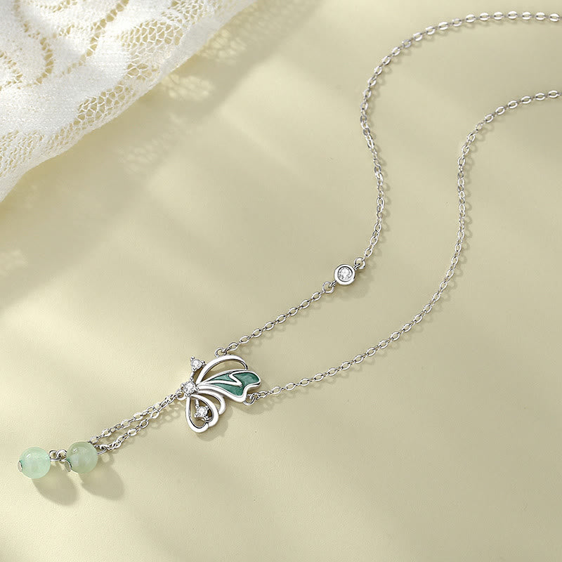 Ensemble collier et boucles d'oreilles papillon en aventurine verte