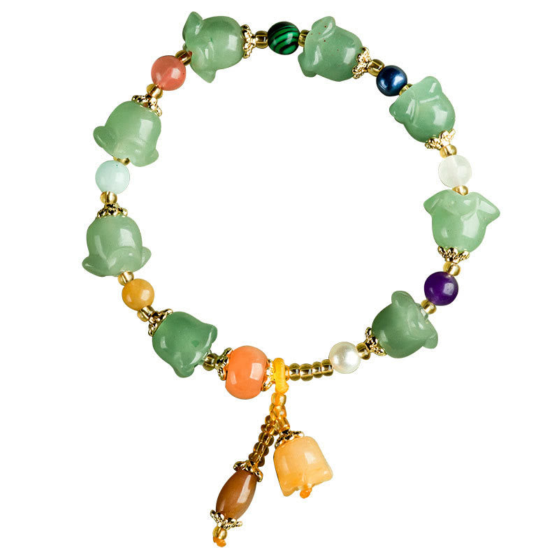 Bracelet porte-bonheur en aventurine verte et fleur de magnolia