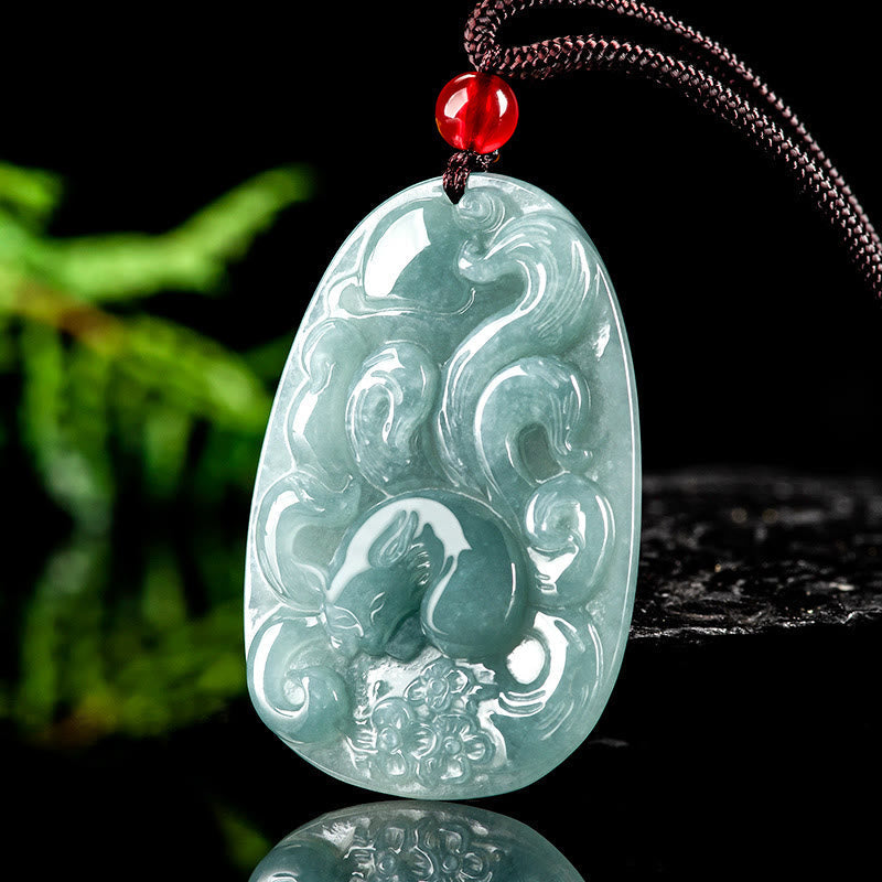 Collier pendentif porte-bonheur en jade vert à neuf queues