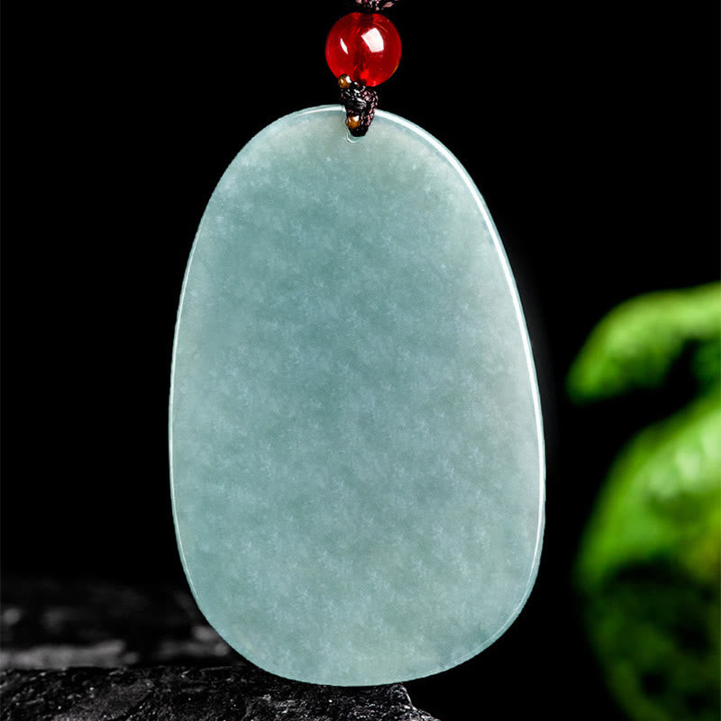 Collier pendentif porte-bonheur en jade vert à neuf queues