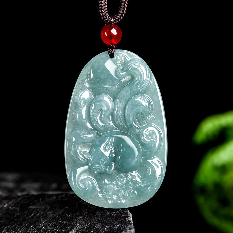 Collier pendentif porte-bonheur en jade vert à neuf queues
