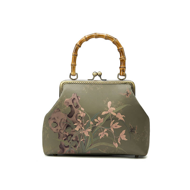 Sac à bandoulière avec poignée en bambou et plantes vertes
