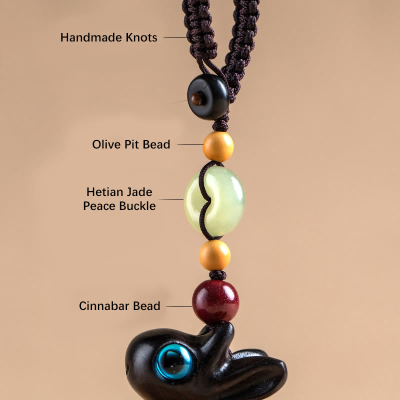 Porte-clés avec boucle de paix en bois de santal vert et ébène