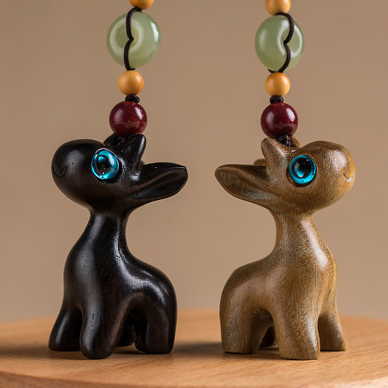 Porte-clés avec boucle de paix en bois de santal vert et ébène