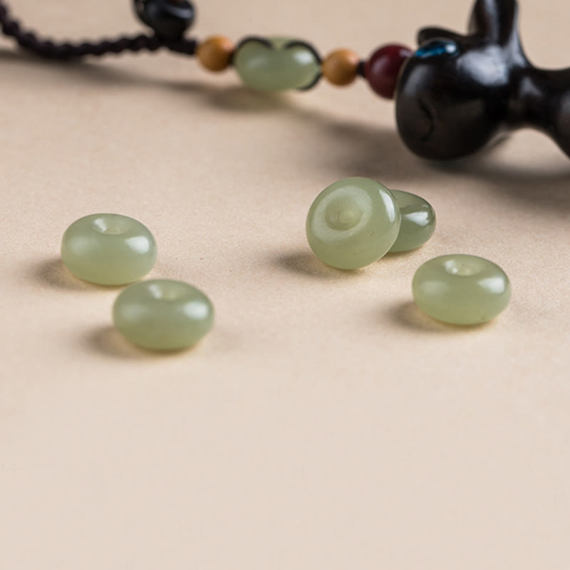 Porte-clés avec boucle de paix en bois de santal vert et ébène