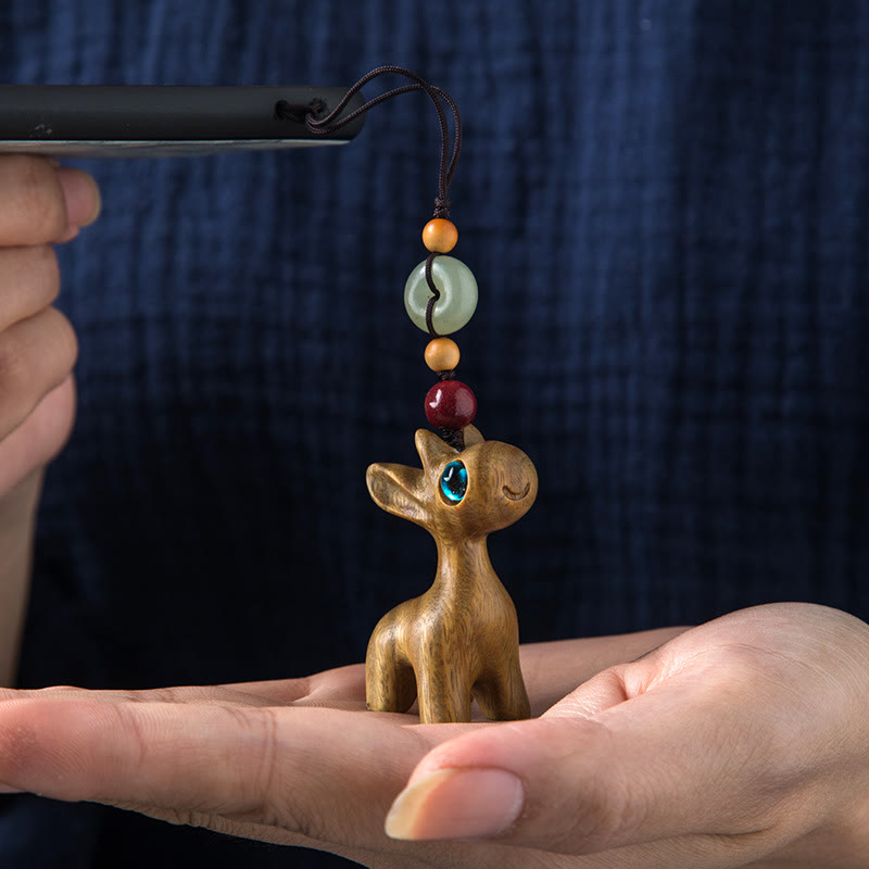 Porte-clés avec boucle de paix en bois de santal vert et ébène