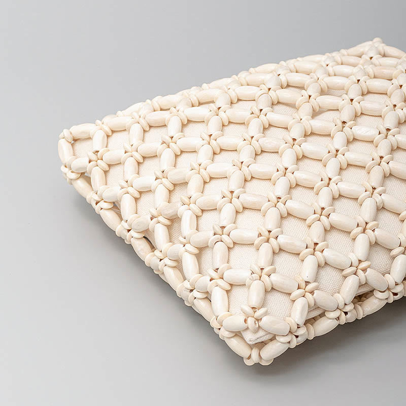 Sac à bijoux spirituel en perles de bois losangées tissées à la main