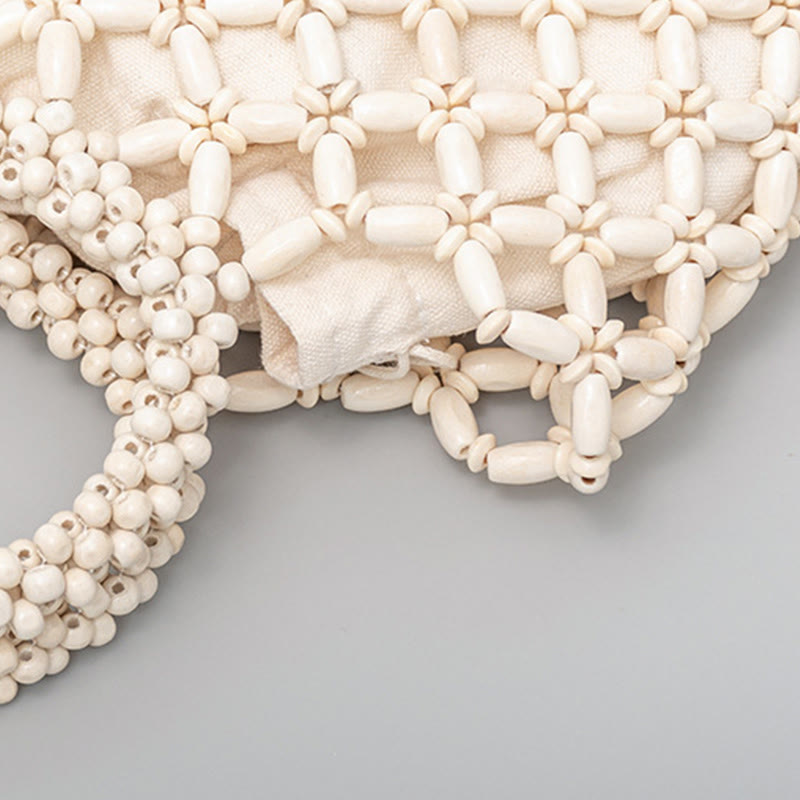 Sac à bijoux spirituel en perles de bois losangées tissées à la main