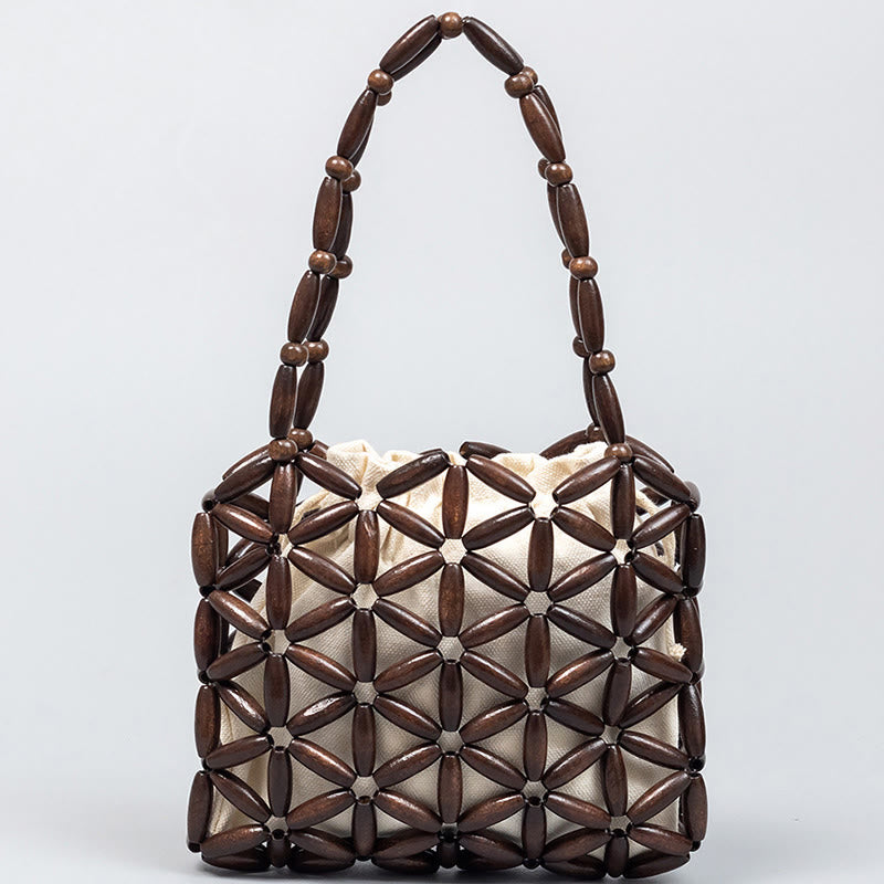 Sac à bijoux spirituel en mini perles de bois tissées à la main