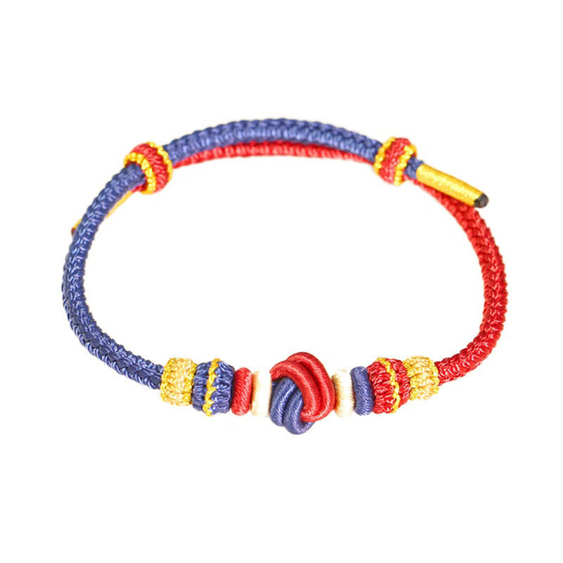 Bracelet en fil rouge bicolore avec nœud de paix fabriqué à la main