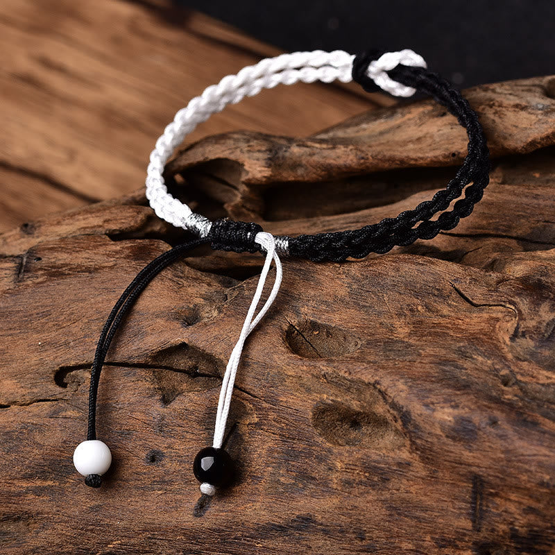 Bracelet tressé en corde rouge noire et blanche fait à la main pour la protection