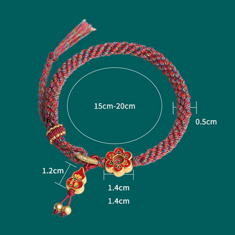 Bracelet de protection en fil rouge fait main avec fleur de courge colorée