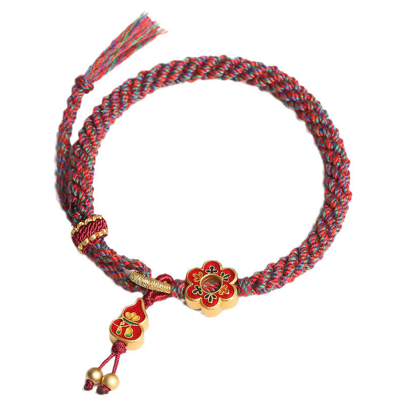 Bracelet de protection en fil rouge fait main avec fleur de courge colorée