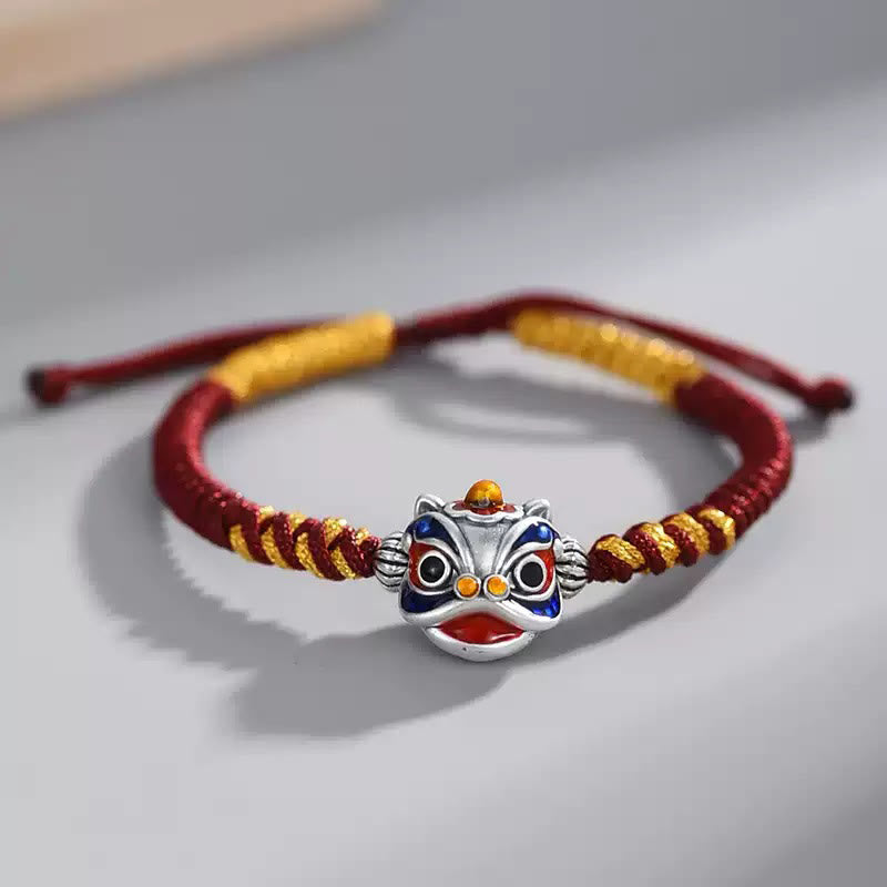 Bracelet de protection en fil rouge fait main avec lion dansant
