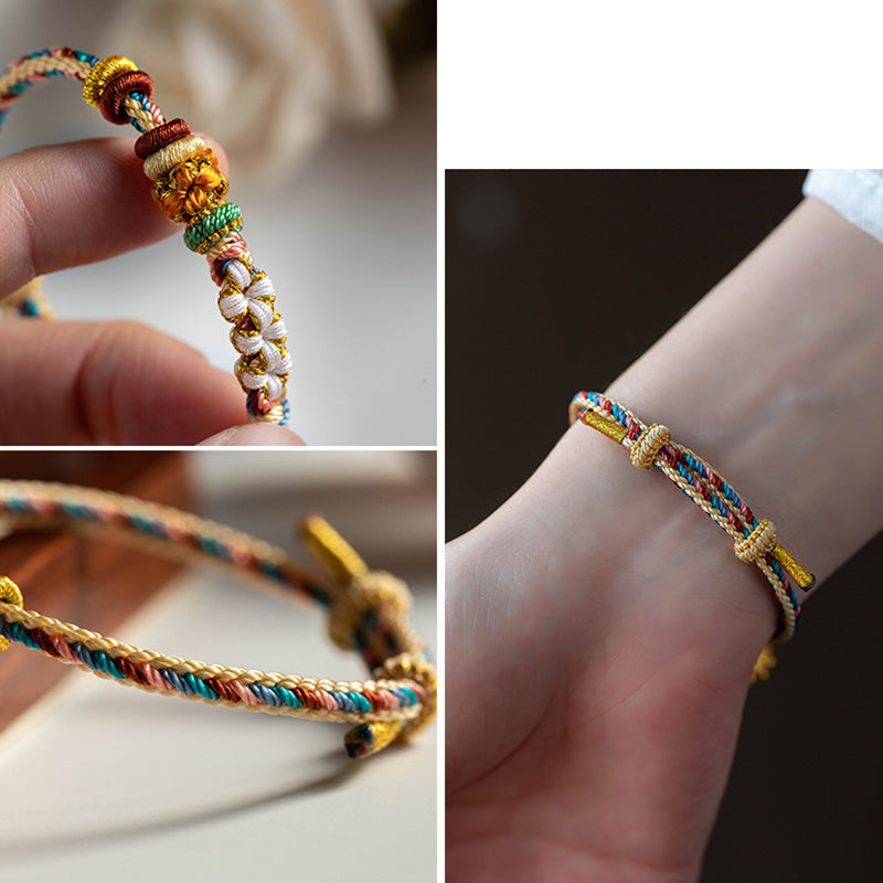 Bracelet en fil rouge à motif de fleurs de pêcher Dunhuang fait main