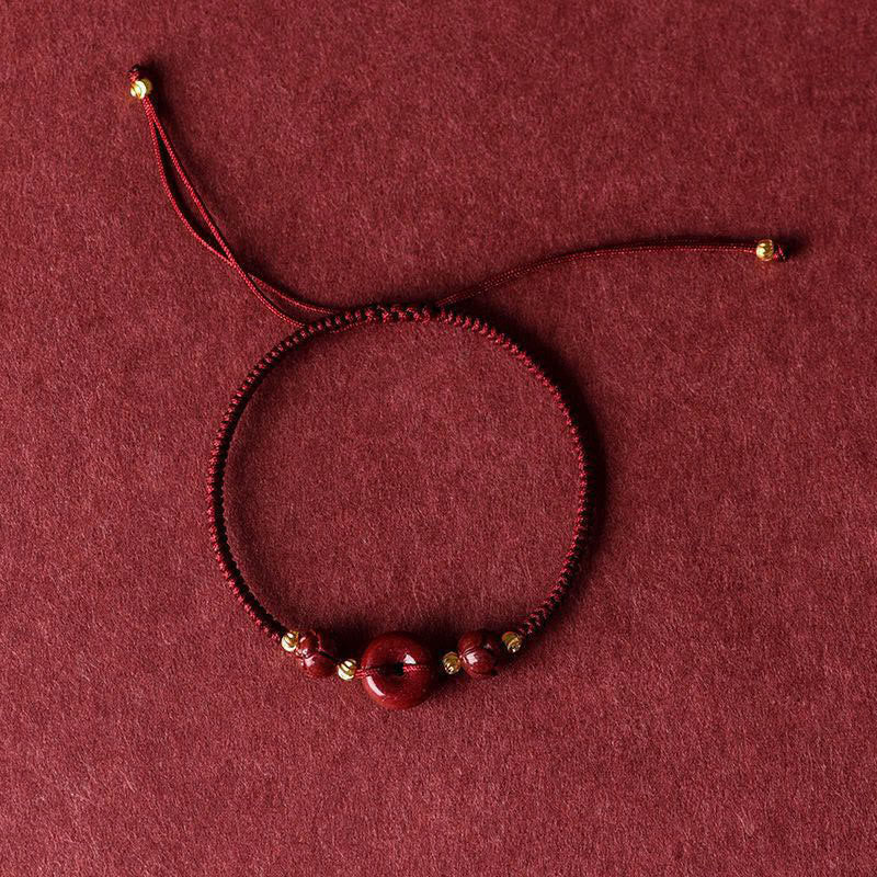 Bracelet de bénédiction fait main en cinabre et lotus avec boucle de paix
