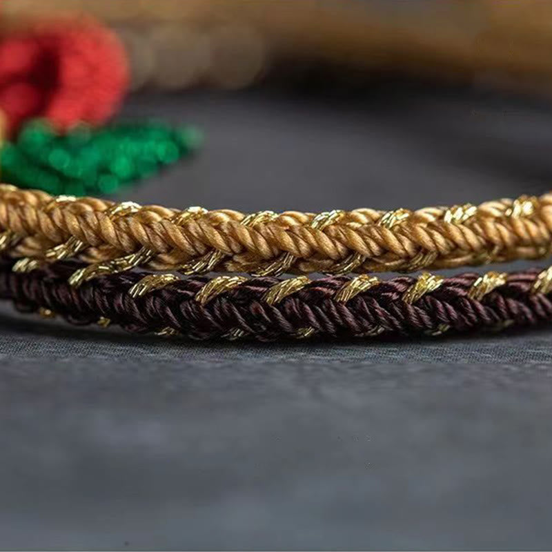 Bracelet en fil rouge fait main avec un nœud de paix à huit fils pour la chance