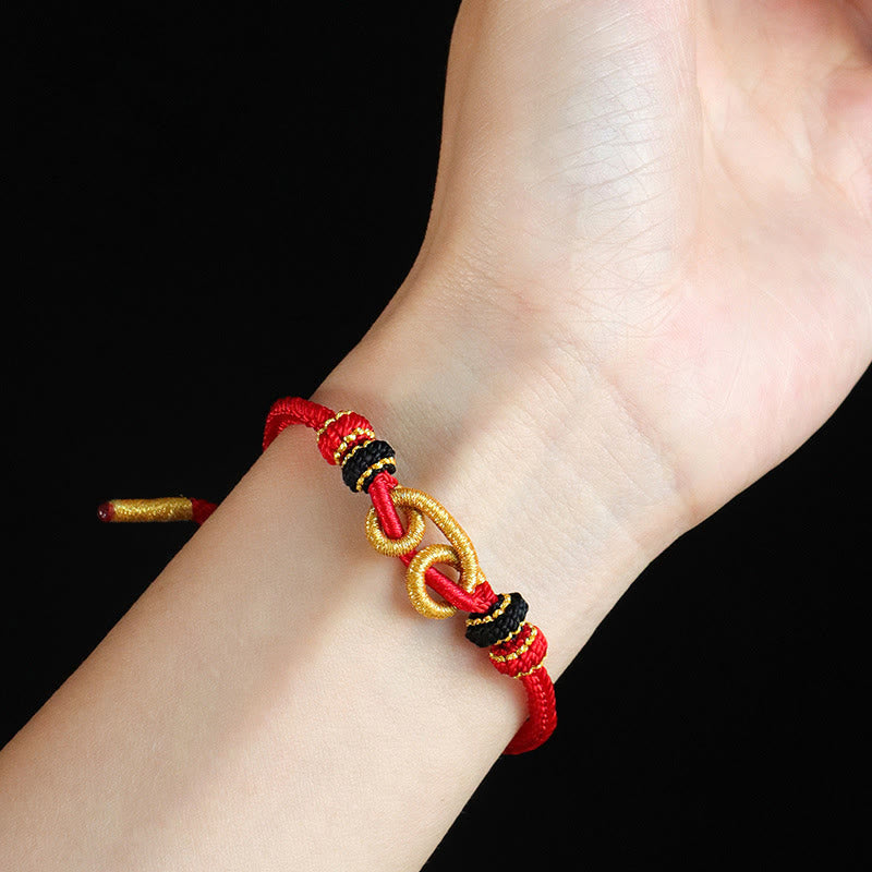 Bracelet de protection en fil rouge fait main avec motif lingot