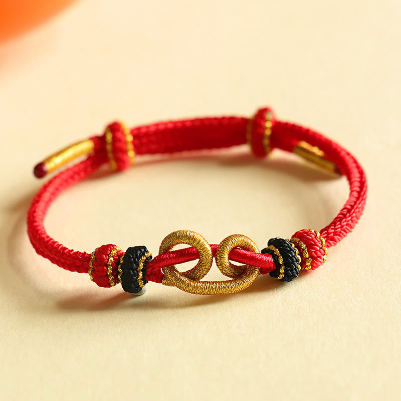 Bracelet de protection en fil rouge fait main avec motif lingot