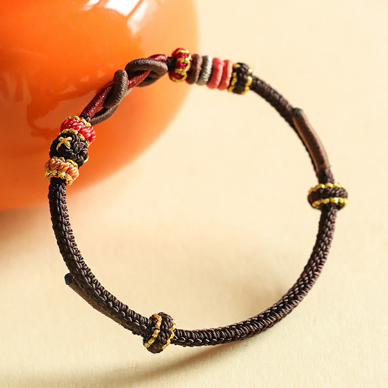Bracelet de protection en fil rouge fait main avec motif lingot