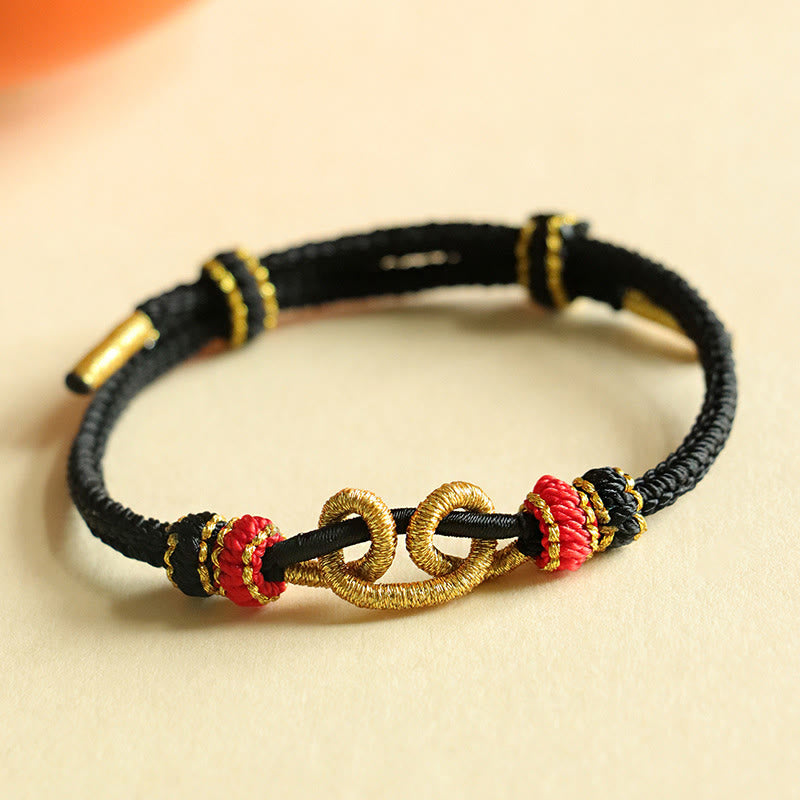 Bracelet de protection en fil rouge fait main avec motif lingot