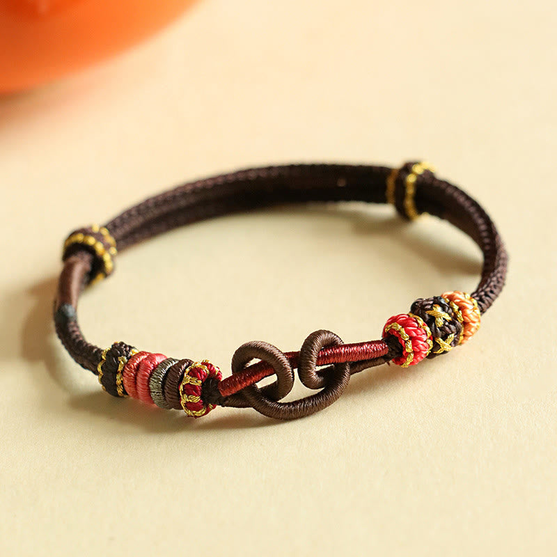 Bracelet de protection en fil rouge fait main avec motif lingot