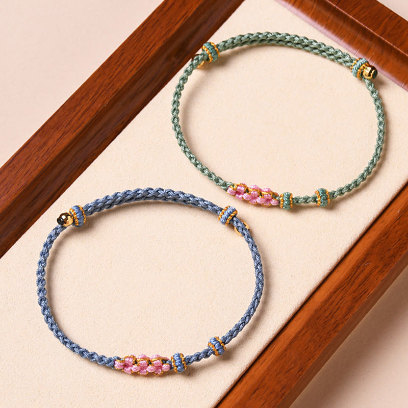 Bracelet de protection en fil rouge fait main pour le renouveau et la chance