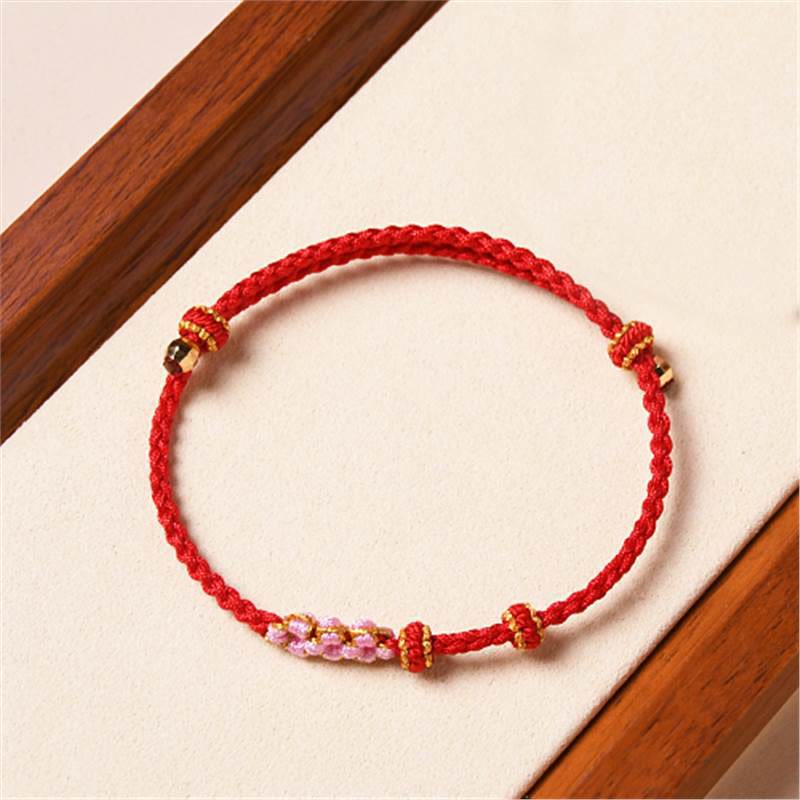 Bracelet de protection en fil rouge fait main pour le renouveau et la chance