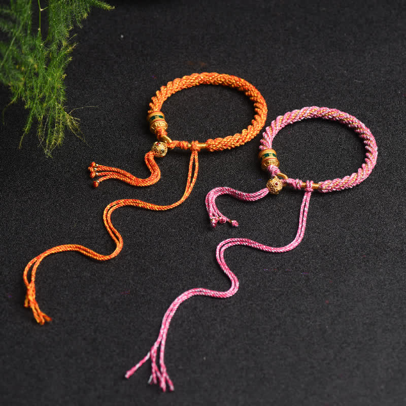 Bracelet tibétain fait main avec roue de prière porte-bonheur en fil rouge