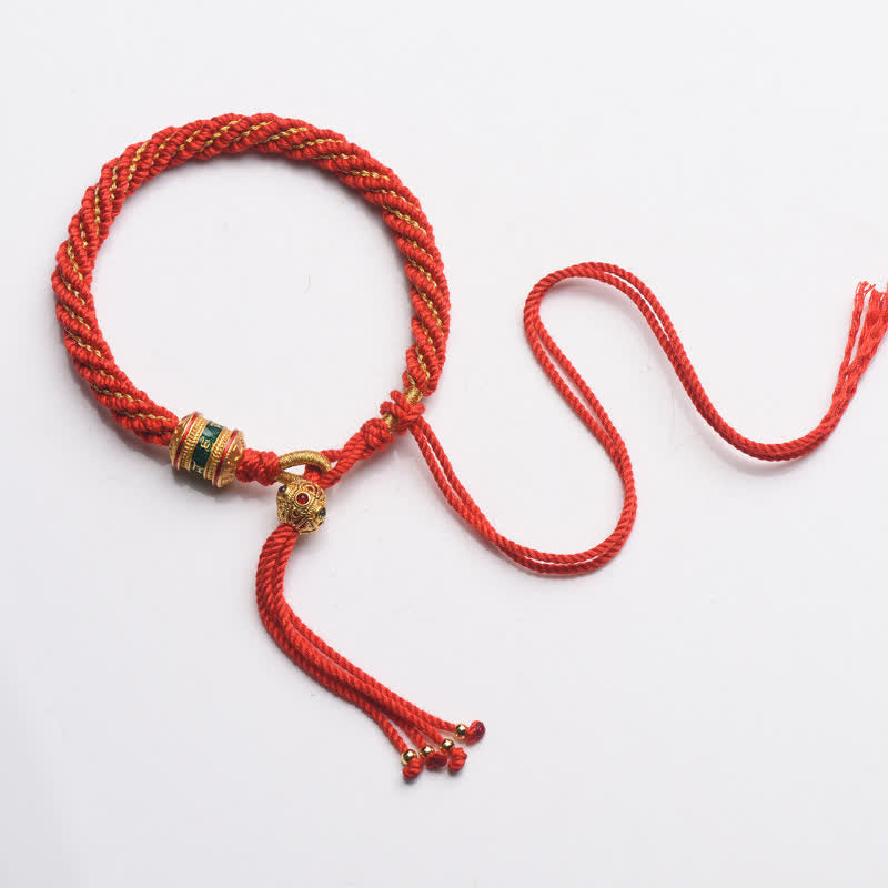Bracelet tibétain fait main avec roue de prière porte-bonheur en fil rouge