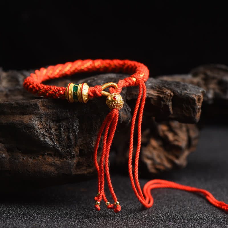 Bracelet tibétain fait main avec roue de prière porte-bonheur en fil rouge