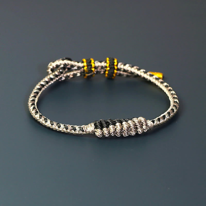 Bracelet de protection tibétain fait main en fil rouge